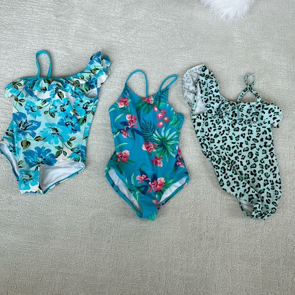 Selling a bundle of blue one piece swimsuits for girls - Picture 1 of 1